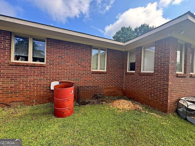 114 Van Dr, Kathleen, GA 31047 - view of side of property featuring brick siding, a lawn, and crawl space