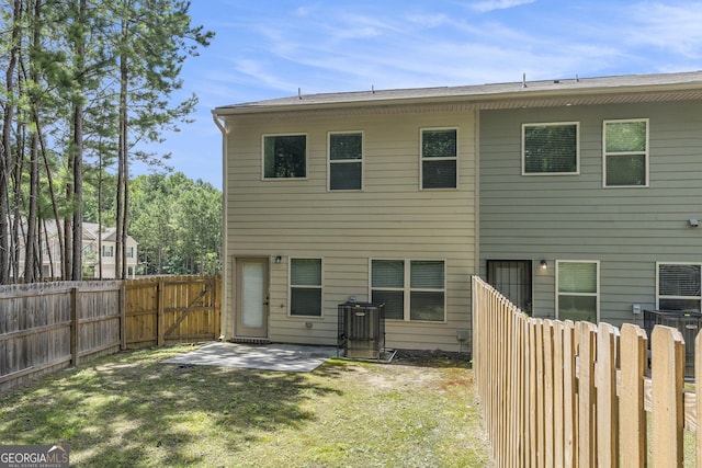 3473 Shoal Oak Ct, Riverdale, GA 30296 - rear view of property with a patio and a fenced backyard