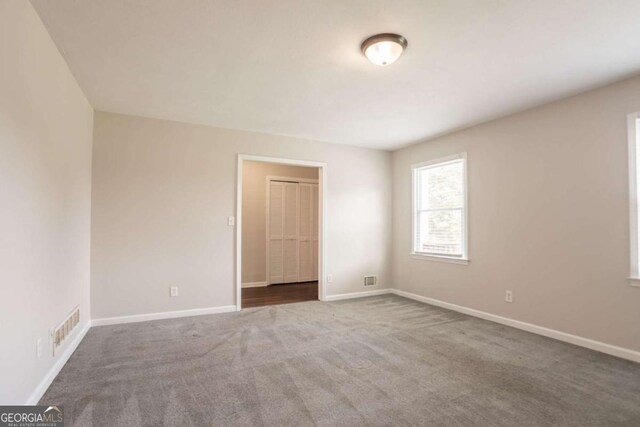 4331 Wrexham Ct, Snellville, GA 30039 - carpeted empty room with baseboards