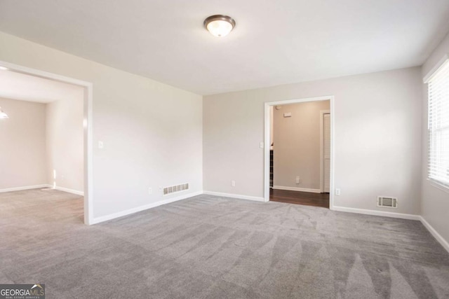 4331 Wrexham Ct, Snellville, GA 30039 - carpeted empty room featuring plenty of natural light and baseboards
