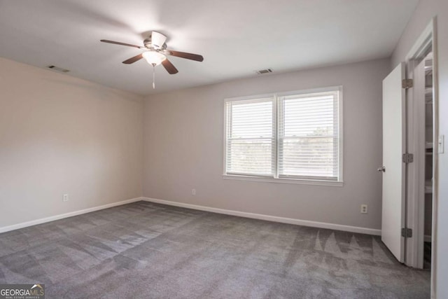 4331 Wrexham Ct, Snellville, GA 30039 - unfurnished bedroom featuring carpet flooring, baseboards, and ceiling fan
