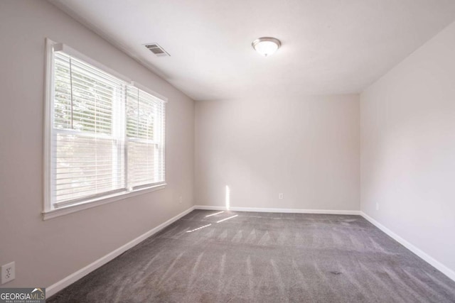4331 Wrexham Ct, Snellville, GA 30039 - carpeted empty room with plenty of natural light and baseboards