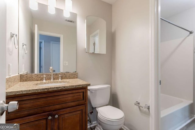 4331 Wrexham Ct, Snellville, GA 30039 - bathroom with toilet, vanity, and tub / shower combination