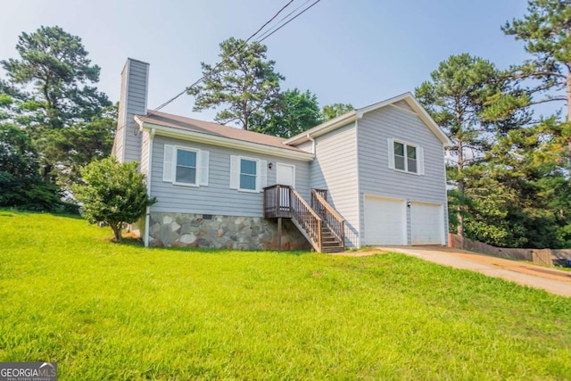 4331 Wrexham Ct, Snellville, GA 30039 - view of front of house featuring a chimney, a garage, a front yard, and driveway