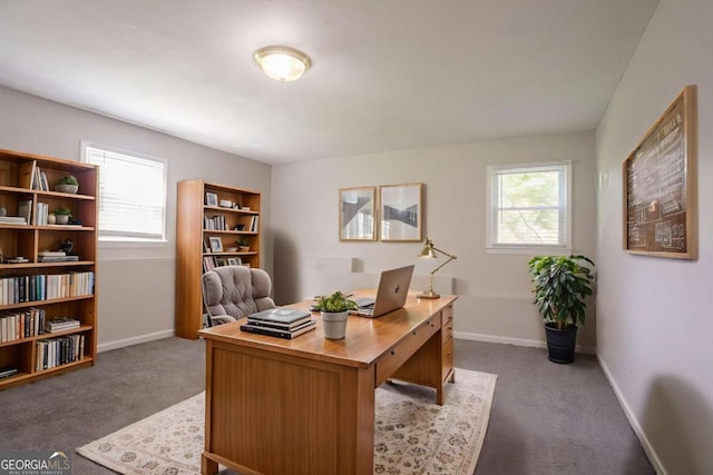 4331 Wrexham Ct, Snellville, GA 30039 - home office featuring dark carpet and baseboards