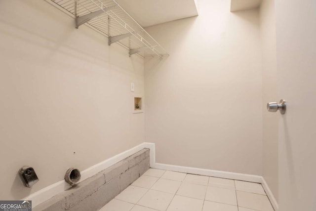 4331 Wrexham Ct, Snellville, GA 30039 - laundry area with hookup for a washing machine, tile patterned flooring, and baseboards
