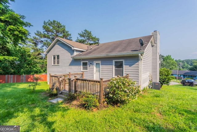 4331 Wrexham Ct, Snellville, GA 30039 - rear view of property featuring a chimney, a wooden deck, and cooling unit