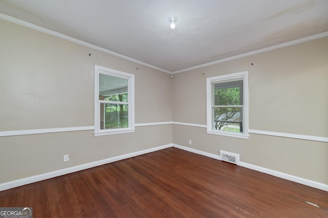 3080 Lynhurst Cir SW, Atlanta, GA 30311 - empty room featuring plenty of natural light, wood finished floors, and ornamental molding