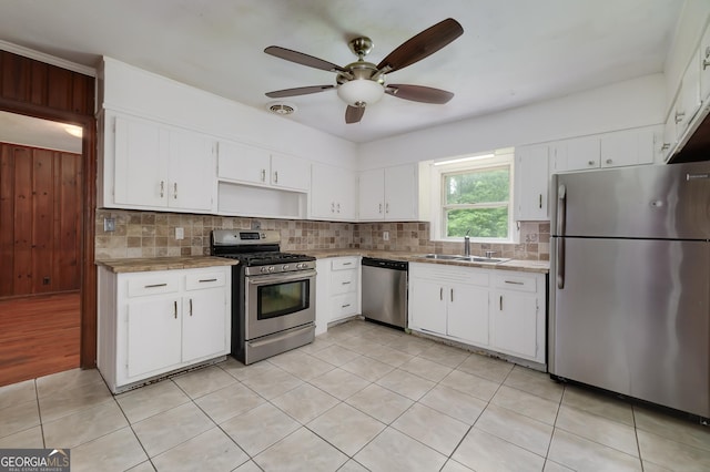 3080 Lynhurst Cir SW, Atlanta, GA 30311 - kitchen featuring stainless steel appliances, backsplash, and light countertops