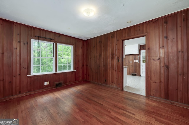 3080 Lynhurst Cir SW, Atlanta, GA 30311 - spare room featuring wood finished floors and wood walls