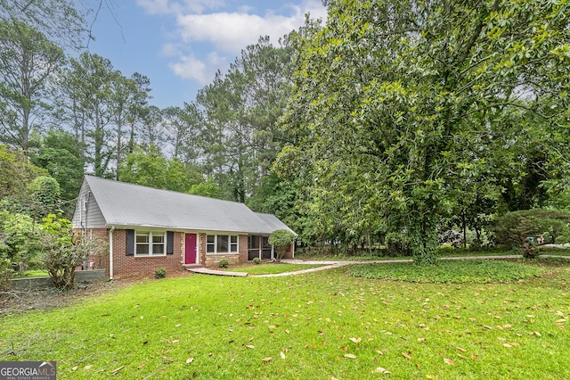 3080 Lynhurst Cir SW, Atlanta, GA 30311 - view of front facade featuring brick siding and a front lawn