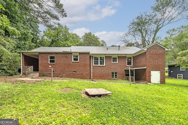 3080 Lynhurst Cir SW, Atlanta, GA 30311 - back of house featuring a yard and brick siding