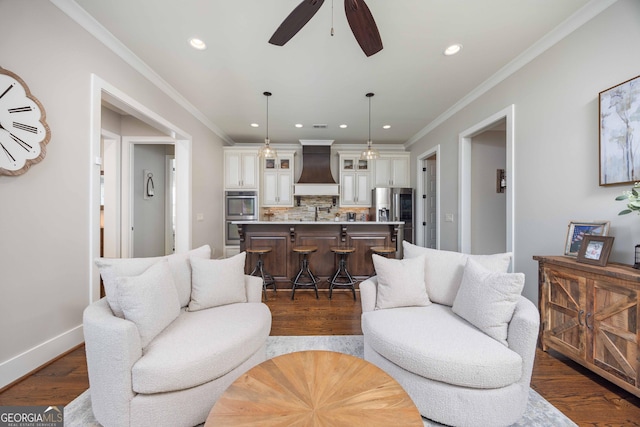 8218 Lallarook Dr, Columbus, GA 31909 - living room featuring dark wood-style floors, recessed lighting, ceiling fan, ornamental molding, and baseboards