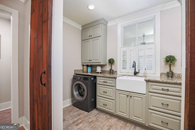 8218 Lallarook Dr, Columbus, GA 31909 - laundry room featuring washer / clothes dryer, a sink, crown molding, baseboards, and light wood finished floors