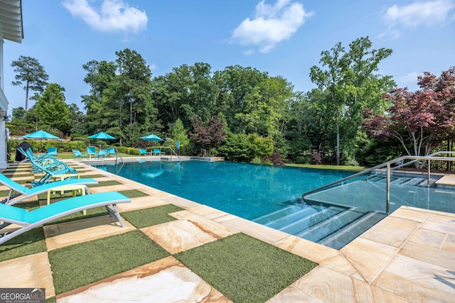 8218 Lallarook Dr, Columbus, GA 31909 - community pool with a patio