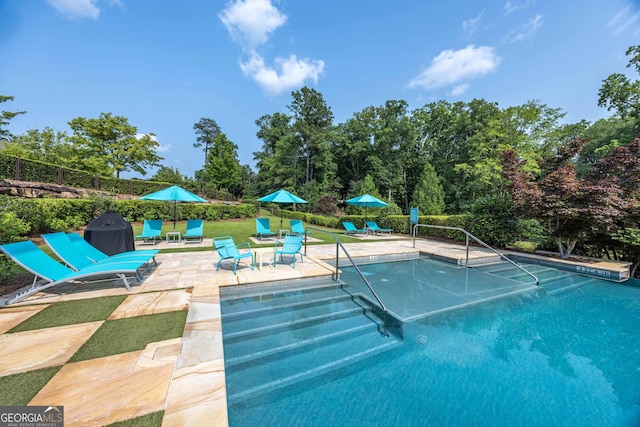 8218 Lallarook Dr, Columbus, GA 31909 - swimming pool with a patio area