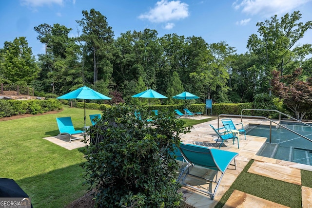 8218 Lallarook Dr, Columbus, GA 31909 - view of pool with a lawn, a tennis court, and a patio area