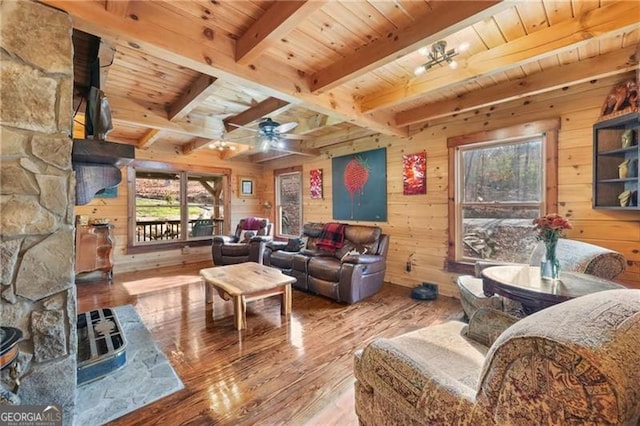 281 Wildwood Ct, Dawsonville, GA 30534 - living room featuring wood-type flooring, wood walls, wooden ceiling with exposed beams, and a ceiling fan