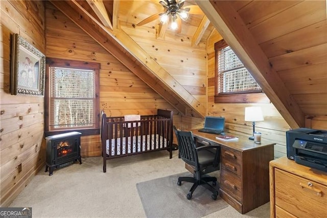281 Wildwood Ct, Dawsonville, GA 30534 - office with plenty of natural light, a wood stove, wooden walls, wooden ceiling with exposed beams, and a ceiling fan