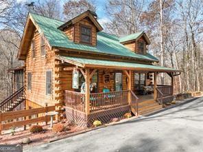 281 Wildwood Ct, Dawsonville, GA 30534 - log home featuring a porch