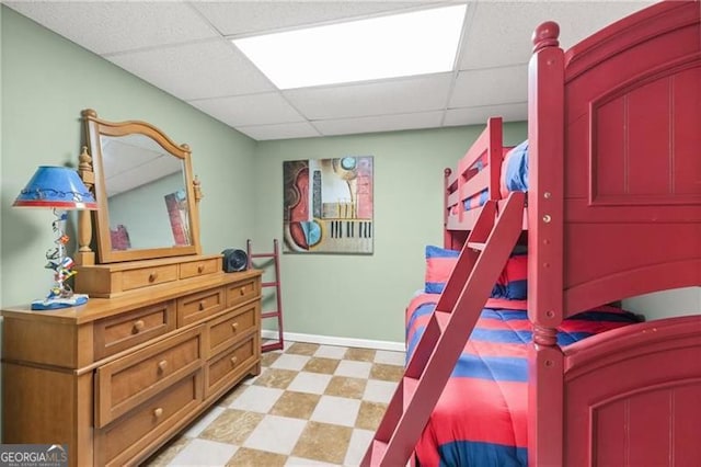 281 Wildwood Ct, Dawsonville, GA 30534 - bedroom featuring a paneled ceiling, light flooring, and baseboards
