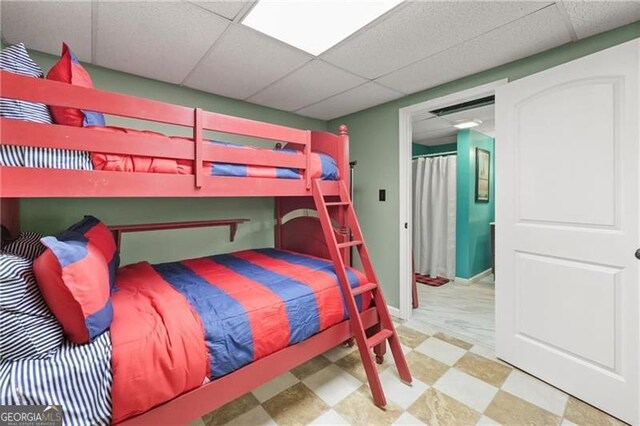 281 Wildwood Ct, Dawsonville, GA 30534 - bedroom with tile patterned floors and a paneled ceiling