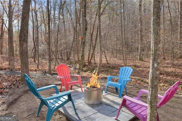 281 Wildwood Ct, Dawsonville, GA 30534 - view of patio / terrace featuring an outdoor fire pit