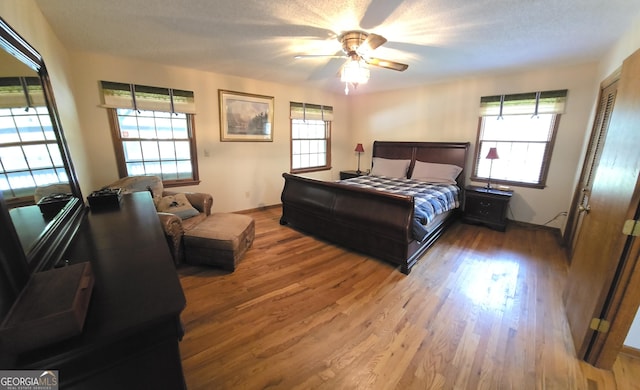 396 Greenleaf Dr, Lavonia, GA 30553 - bedroom featuring wood finished floors, baseboards, and ceiling fan