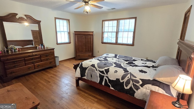 396 Greenleaf Dr, Lavonia, GA 30553 - bedroom featuring wood finished floors, a ceiling fan, and baseboards
