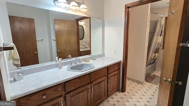 396 Greenleaf Dr, Lavonia, GA 30553 - full bathroom with tile patterned floors, vanity, and shower / bathtub combination with curtain