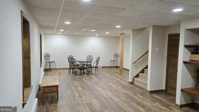 396 Greenleaf Dr, Lavonia, GA 30553 - dining room featuring wood finished floors, stairway, baseboards, recessed lighting, and a paneled ceiling