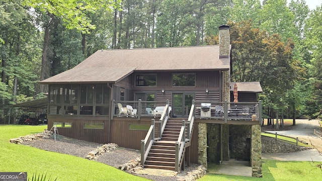 396 Greenleaf Dr, Lavonia, GA 30553 - view of front of house featuring stairway, a deck, a chimney, roof with shingles, and a front yard