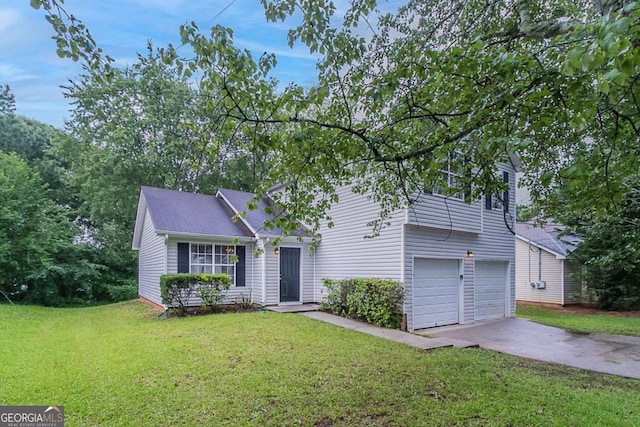 5421 Salem Springs Dr, Lithonia, GA 30038 - view of front of property with a front lawn, concrete driveway, and an attached garage