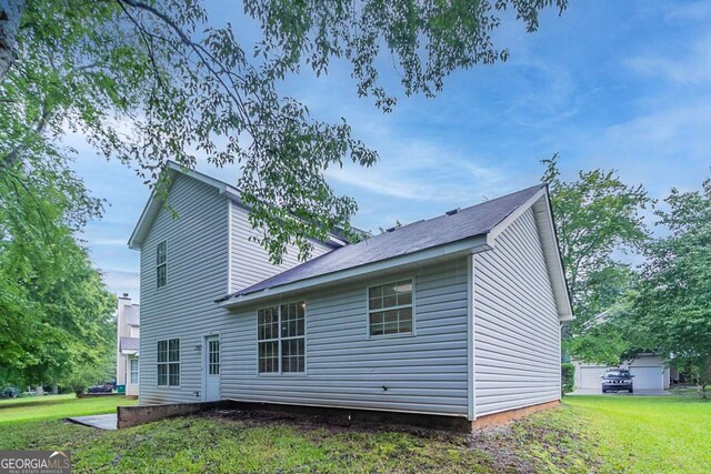 5421 Salem Springs Dr, Lithonia, GA 30038 - rear view of property featuring a yard