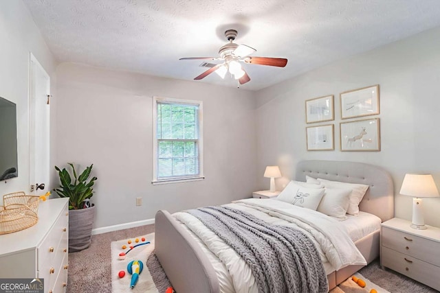 604 Hamlet Ct SE, Conyers, GA 30094 - carpeted bedroom featuring baseboards and ceiling fan