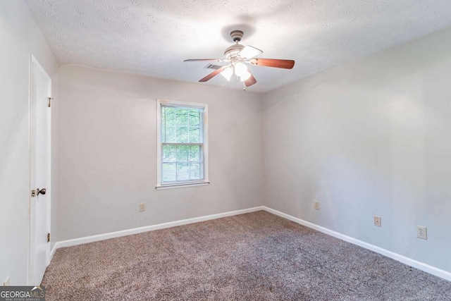 604 Hamlet Ct SE, Conyers, GA 30094 - carpeted empty room with a textured ceiling, ceiling fan, and baseboards
