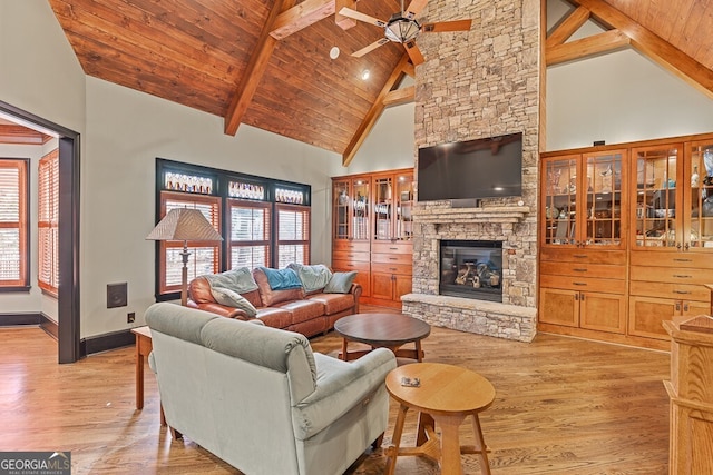 2304 Weeping Oak Dr, Braselton, GA 30517 - living area featuring a ceiling fan, light wood-type flooring, high vaulted ceiling, wooden ceiling with exposed beams, and plenty of natural light