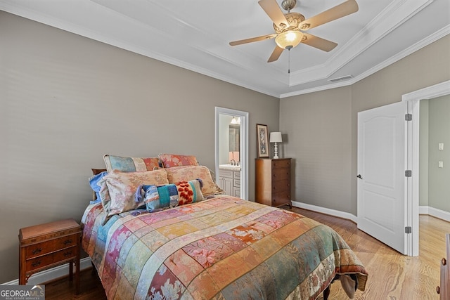 2304 Weeping Oak Dr, Braselton, GA 30517 - bedroom with a raised ceiling, wood finished floors, baseboards, ornamental molding, and ceiling fan