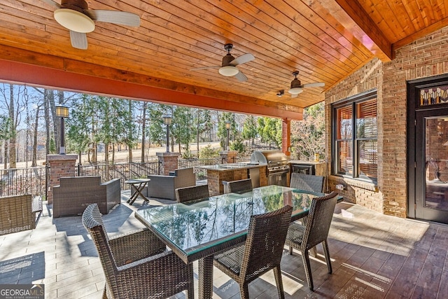2304 Weeping Oak Dr, Braselton, GA 30517 - deck with ceiling fan and outdoor dining space