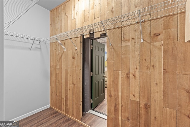 2304 Weeping Oak Dr, Braselton, GA 30517 - walk in closet with wood finished floors