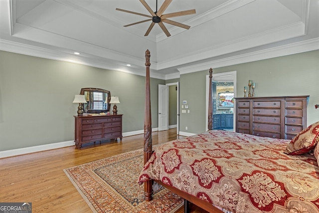 2304 Weeping Oak Dr, Braselton, GA 30517 - bedroom featuring a tray ceiling, wood finished floors, crown molding, baseboards, and recessed lighting
