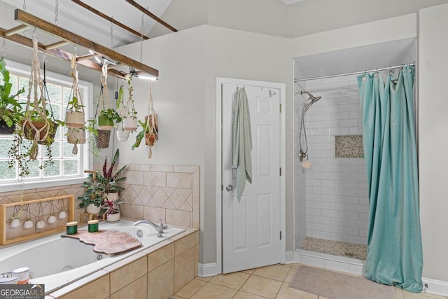 344 Mckibben Dr, Locust Grove, GA 30248 - full bathroom with a tub with jets, a tile shower, and tile patterned flooring
