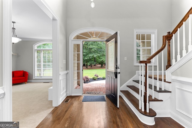 155 Carrolls Way, Fayetteville, GA 30215 - entryway with stairs, dark wood-style floors, a decorative wall, and a wainscoted wall