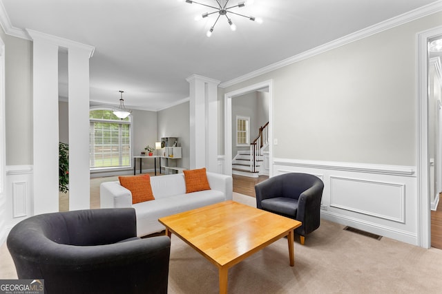 155 Carrolls Way, Fayetteville, GA 30215 - living area featuring ornamental molding, stairway, wainscoting, decorative columns, and a decorative wall