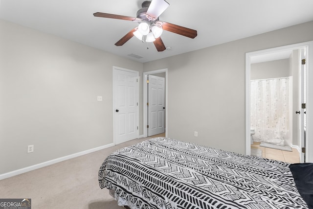155 Carrolls Way, Fayetteville, GA 30215 - bedroom with baseboards, light carpet, connected bathroom, and a ceiling fan