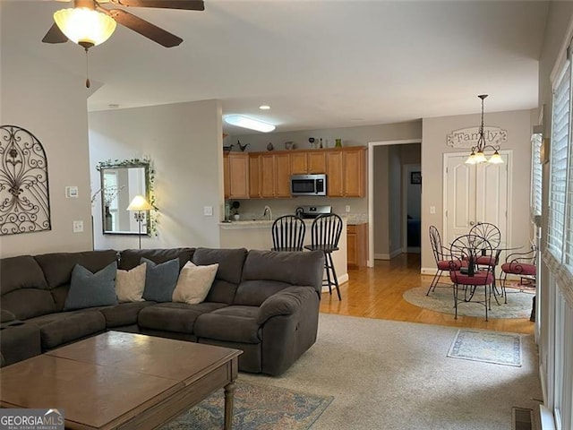 107 Sedgefield Overlook, Dallas, GA 30157 - living room with light wood-style flooring, plenty of natural light, a ceiling fan, and recessed lighting