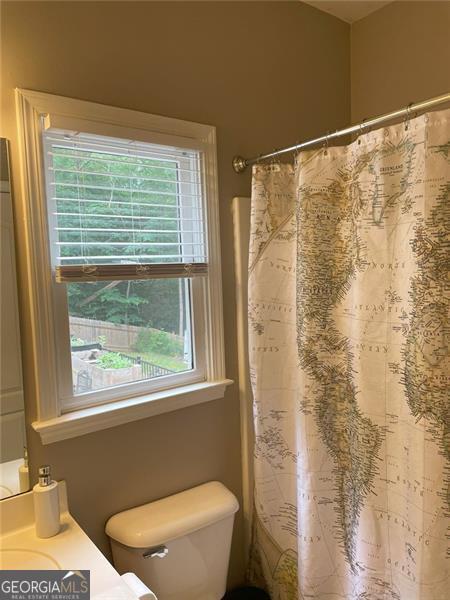 107 Sedgefield Overlook, Dallas, GA 30157 - full bath with vanity and a shower with curtain