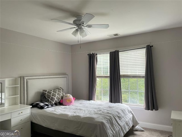 107 Sedgefield Overlook, Dallas, GA 30157 - carpeted bedroom with baseboards and ceiling fan