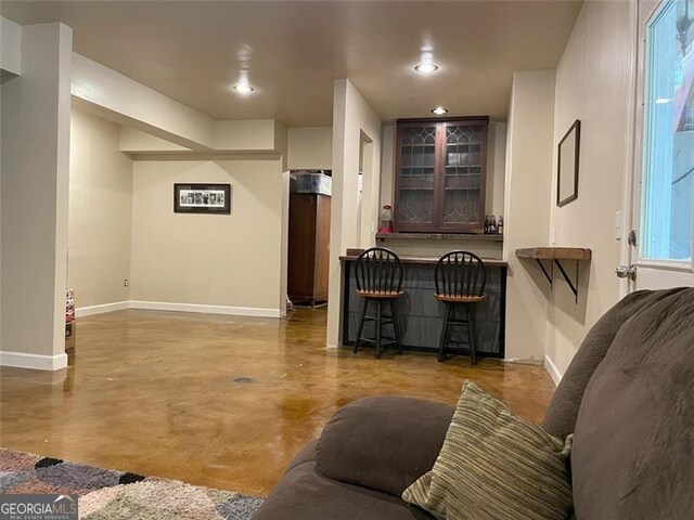 107 Sedgefield Overlook, Dallas, GA 30157 - living area featuring concrete floors and recessed lighting