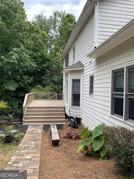 107 Sedgefield Overlook, Dallas, GA 30157 - view of property exterior with a wooden deck